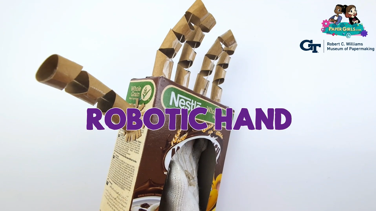 Robotic hand made from a cereal box with paper towel tubes attached as fingers